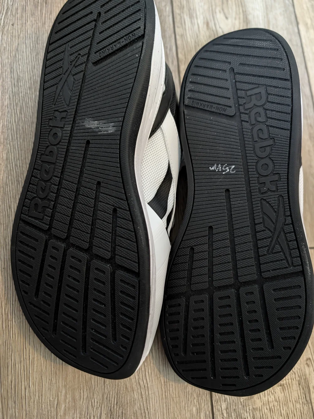 Men's Lace- Up Reebok Nano Sneakers.